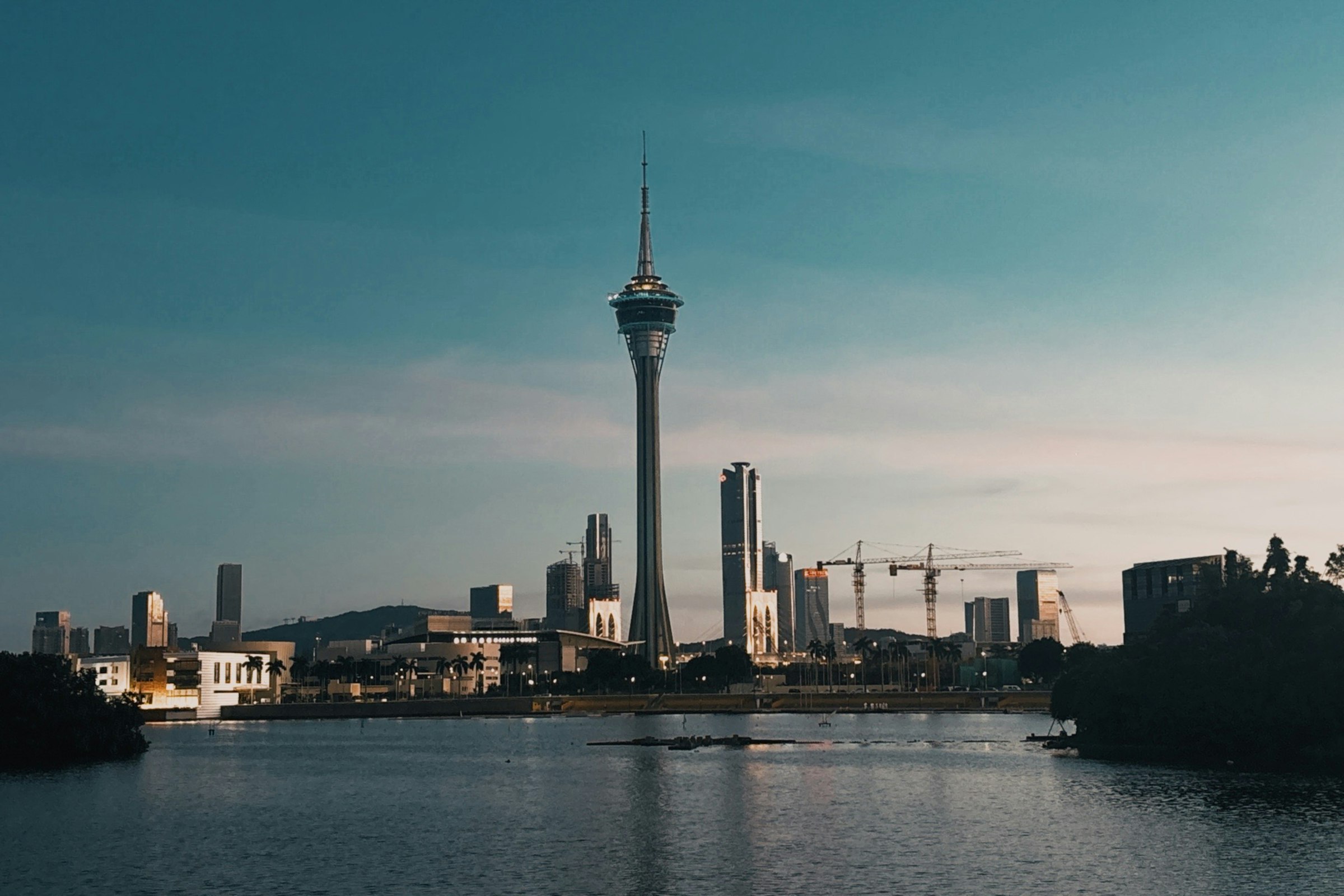Macao skyline across Nam Van Lake at dusk